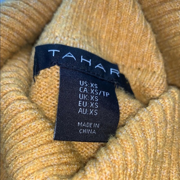 Mustard yellow turtleneck sweater. - Picture 2 of 3
